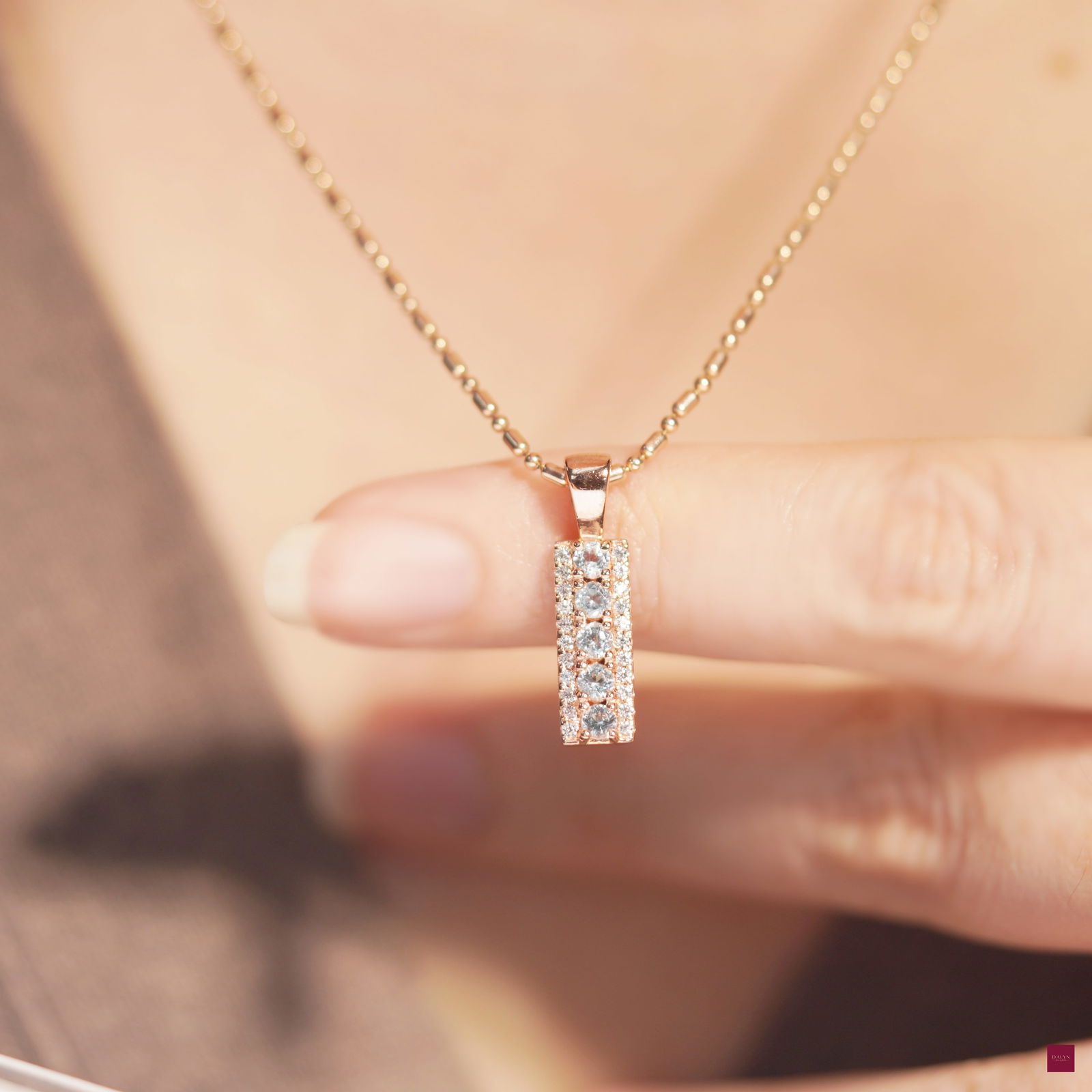 18K Rose Gold Plate Sterling Silver Natural Sky Blue Topaz and White Zircon Bar Pendant (No chain): 18K Rose Gold Plate Sterling Silver Natural Sky Blue Topaz and White Zircon Bar Pendant Stone: Natural Sky Blue Topaz and White Zircon Metal: Gold plated silver 925 Approx. Weight: 1.26 g. Approx. Gem