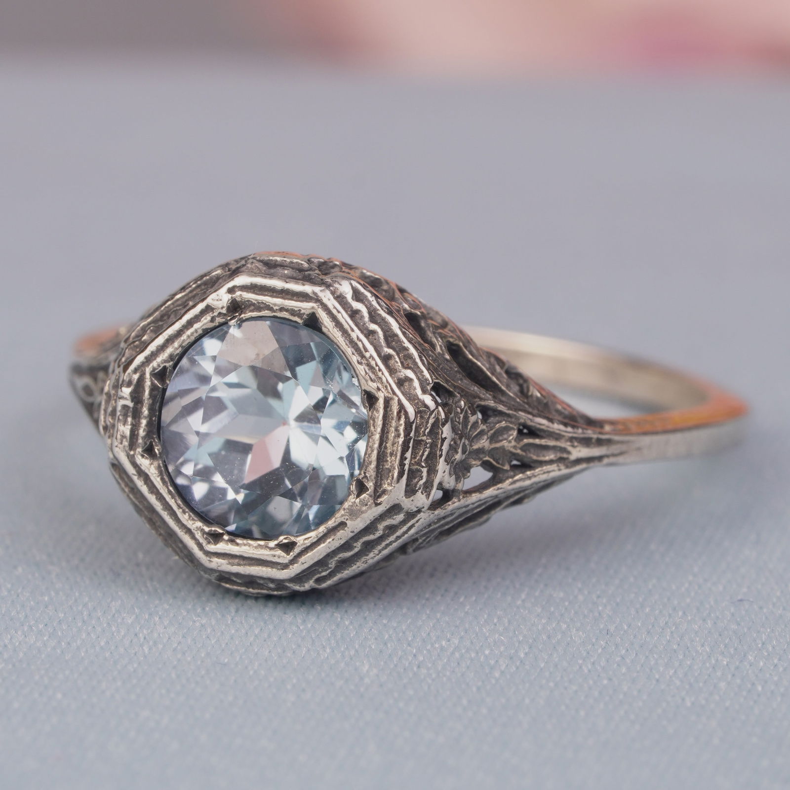 Silver925 Natural Blue Topaz Vintage Filigree Ring: CHARACTERISTICSStatus: In stockOrigin: ThailandMetal: Silver 925Ring Size: US 9Total Gemstones Weight: 3.24 carat. (approx.)Total Gram Weight: 2.77 g. (approx.)*Pictures have been enlarged to show det
