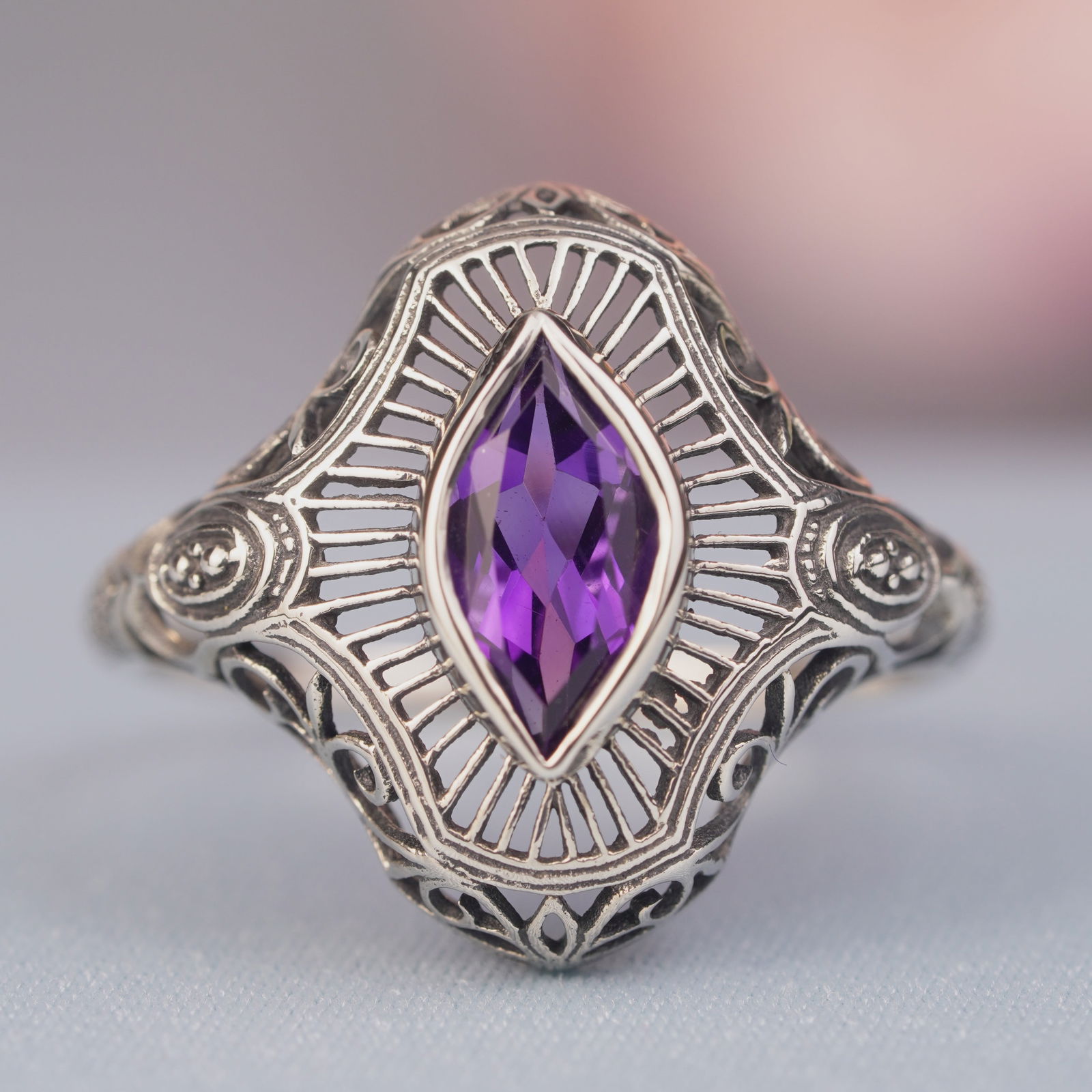 Silver925 Natural Amethyst Vintage Filigree Ring: CHARACTERISTICSStatus: In stockOrigin: ThailandMetal: Silver 925Ring Size: US 9Total Gemstones Weight: 1.07 carat. (approx.)Total Gram Weight: 2.21 g. (approx.)*Pictures have been enlarged to show det