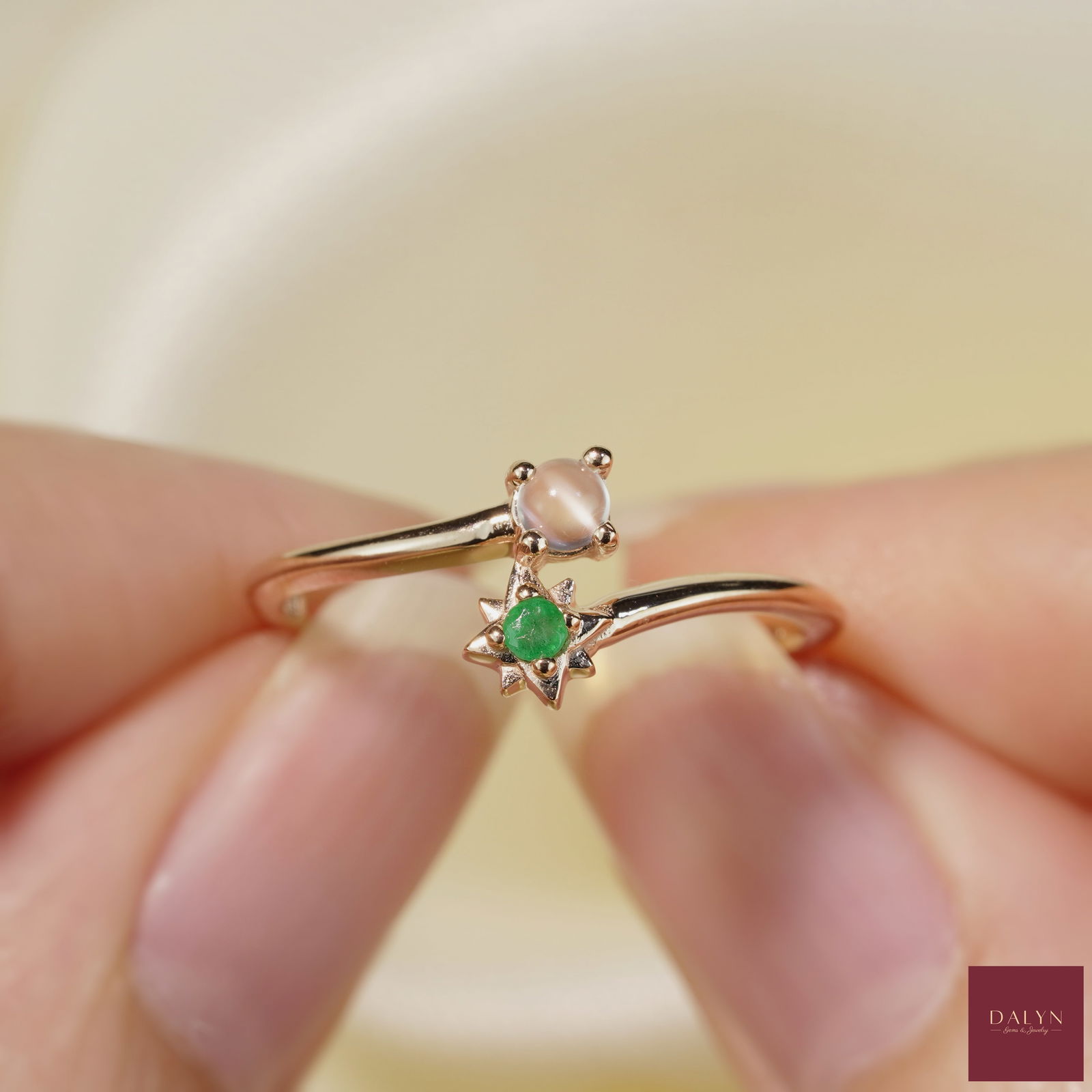 18K Rose Gold Plate Sterling Silver Natural Moonstone and Emerald Ring: 18K Rose Gold Plate Sterling Silver Natural Moonstone and Emerald Ring Stone: Natural Moonstone, Emerald Metal: Gold plated silver 925 Approx. Weight: 1.54 g. Approx. Gemstone Weight: 0.18 carat Size: