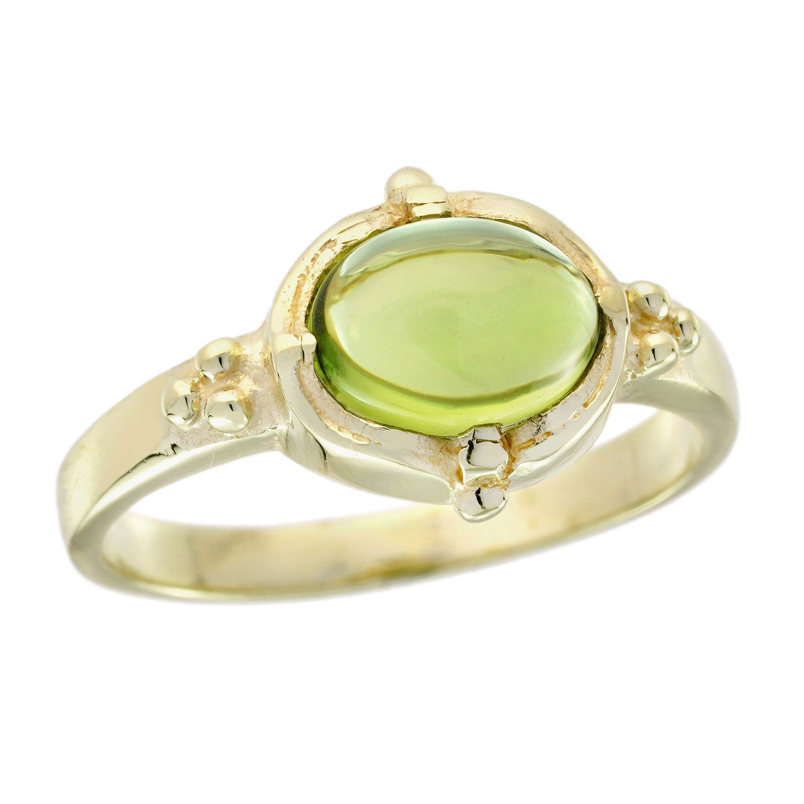 9K Yellow Gold Natural Cabochon Peridot Vintage Style Ring: CHARACTERISTICSOrigin: ThailandMetal: Solid 9K Yellow GoldRing Size: US 7Total Gemstones Weight: 1.30 carat. (approx.)Total Gram Weight: 2.60 g. (approx.)*Pictures have been enlarged to show details*P