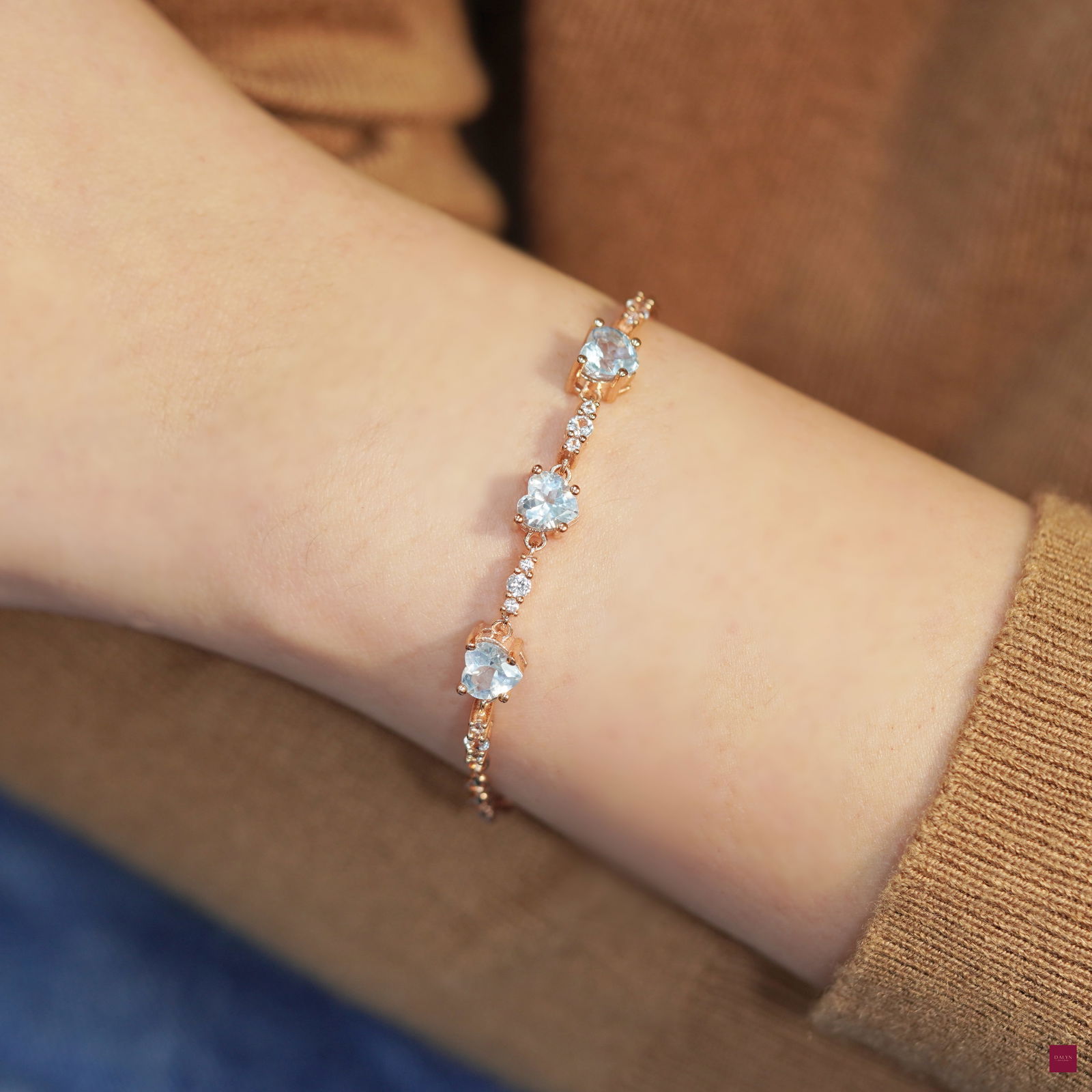 18K Rose Gold Plate Sterling Silver Natural Sky Blue Topaz and White Topaz Bracelet: 18K Rose Gold Plate Sterling Silver Natural Sky Blue Topaz and White topaz Bracelet Stone: Natural Citrine Metal: Gold plated silver 925 Approx. Weight: 5.87 g. Approx. Gemstone Weight: 3.17 carat Loc