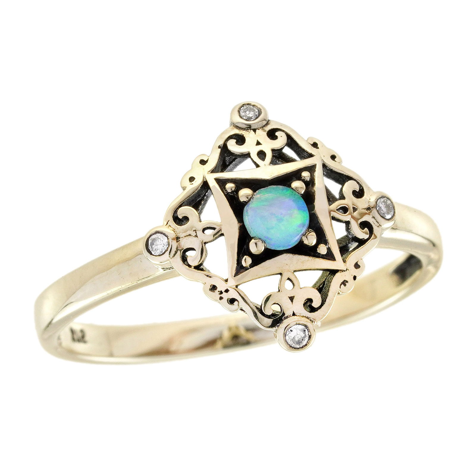 9K Yellow Gold Natural Opal and Diamond Vintage Style Filigree Ring: CHARACTERISTICSOrigin: ThailandMetal: Solid 9K Yellow GoldRing Size: US 7Total Gemstones Weight: 0.12 carat. (approx.)Total Gram Weight: 1.50 g. (approx.)*Pictures have been enlarged to show details*P