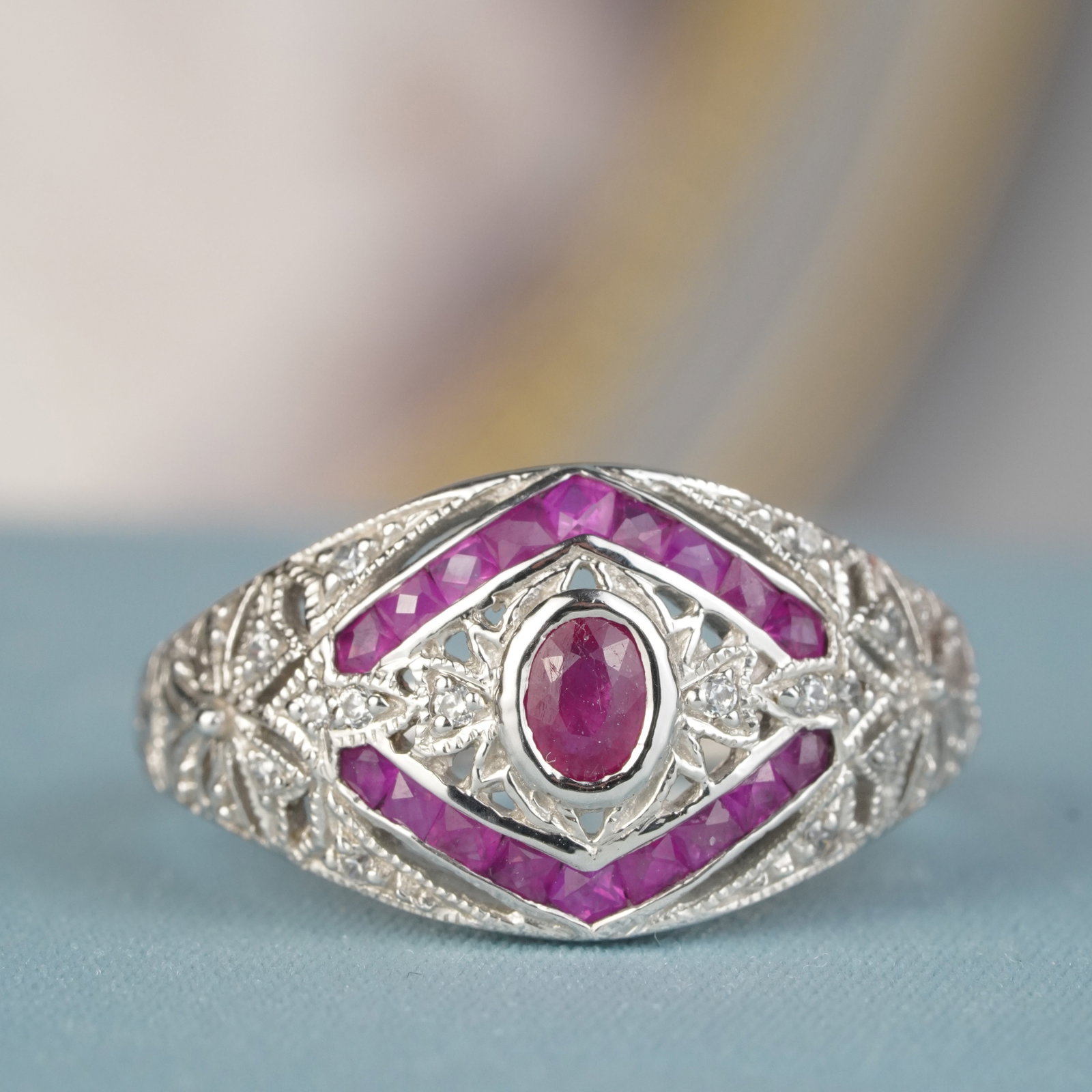 Silver925 Ruby Cubic Zirconia Vintage Style Filigree Ring: CHARACTERISTICS Metal: Sterling Silver 925 Ring Size: US 7 Total Gemstones Weight: 1.11 carat. (approx.) Total Gram Weight: 2.61 g. (approx.) *Pictures have been enlarged to show details** PRIMARY STO