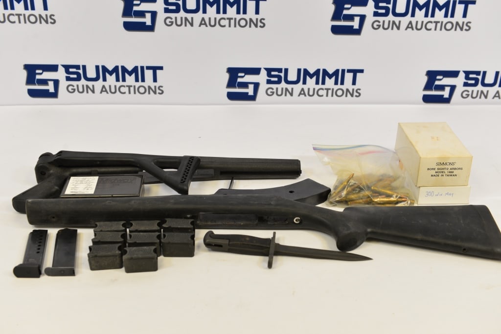 Various Manufacturers Mixed Lot Rifle Stocks: Lot includes side folding SKS polymer stock, Hogue stock possibly for Remington 700, one custom steel SKS magazine, 1911 magazine .45ACP, one Sig 9mm Magazine,. unmarked bayonet, M1 Garand clips, Simm