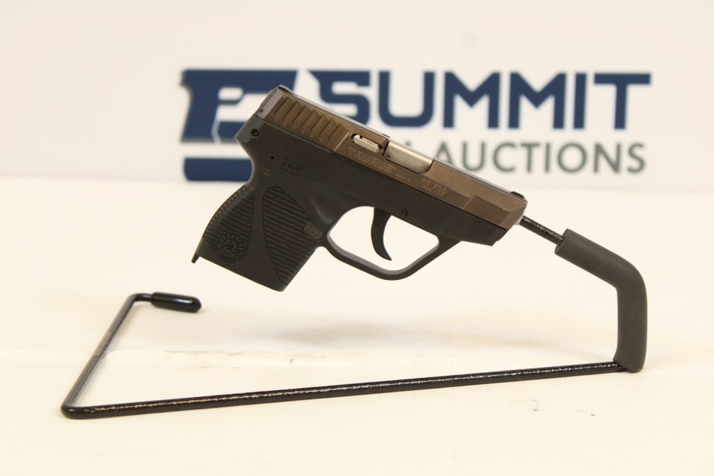 Taurus PT 738 TCP .380 Auto: This Taurus PT 738is chambered in .380 ACP with a matte stainless steel slide and barrel. This semi automatic pistol is in good condition with normal signs of use and wear. It has fixed sights and one