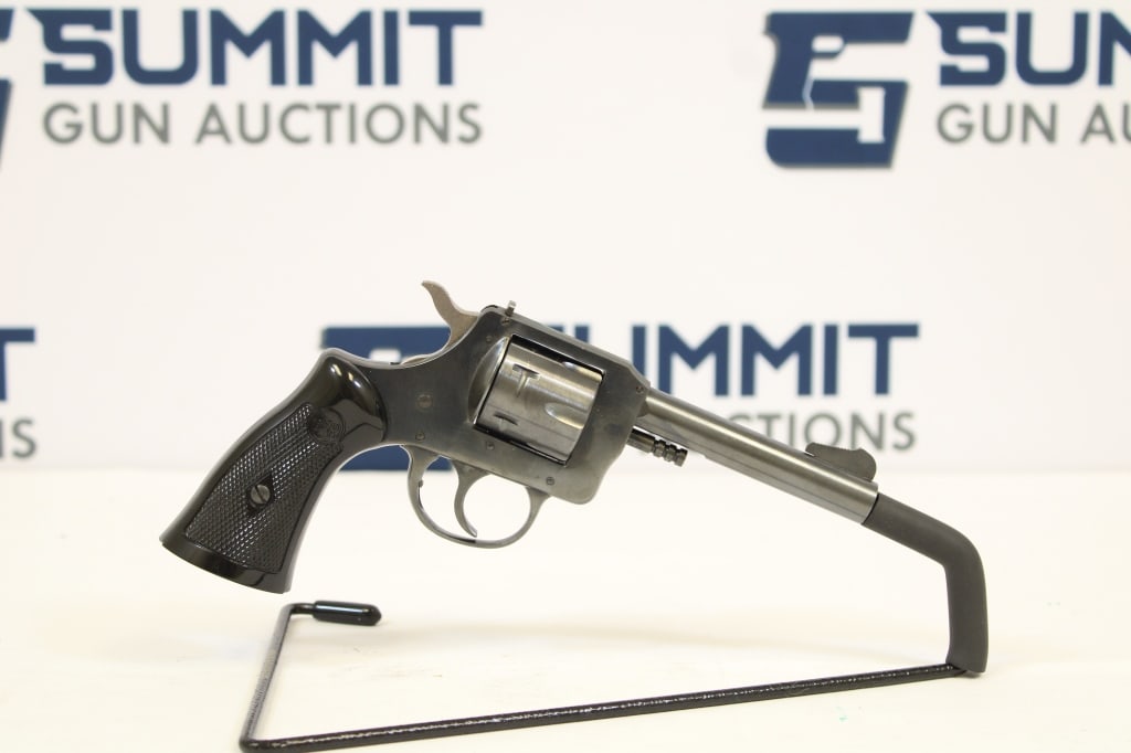 H&R 732 .32 S&W: This vintage H&R Harrington & Richardson model 732 .22 revolver .The 732 rimfire revolver has a 4 inch barrel, The barrel has a ramped front sight and adjustable rear sights. Checkered plastic grips. 