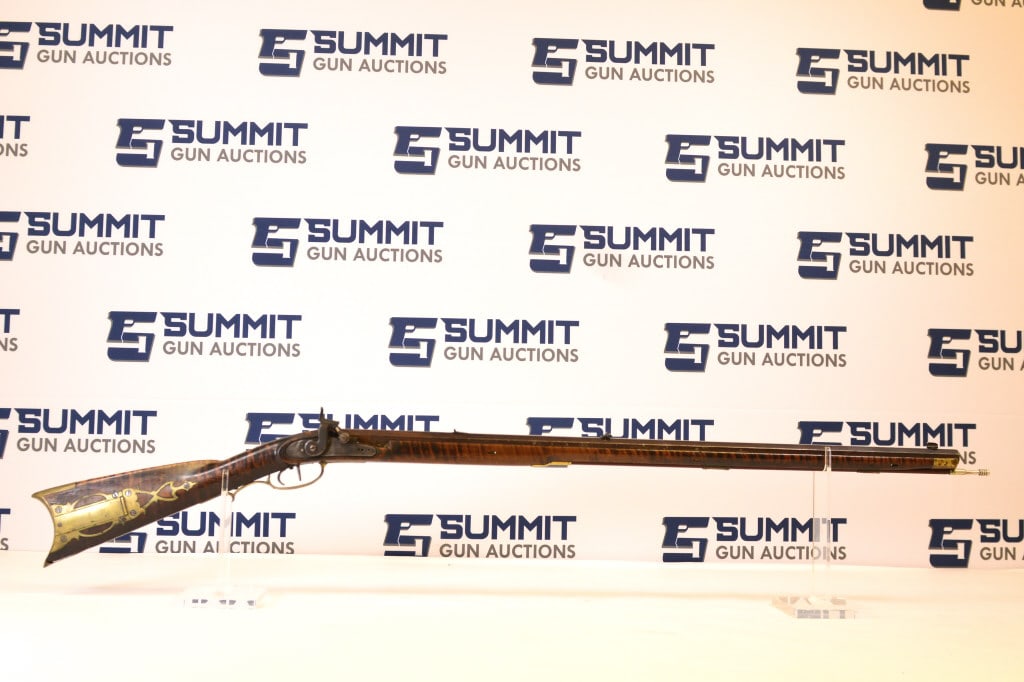 A. Trussel Sweitner Percussion Rifle: This percussion rifle requires a little research. Comes with a 33" octagon barrel, nice inlay, marked "A". Trussel" on receiver, and "Sweitner" on barrel. Some visible glue on the receiver. Please see