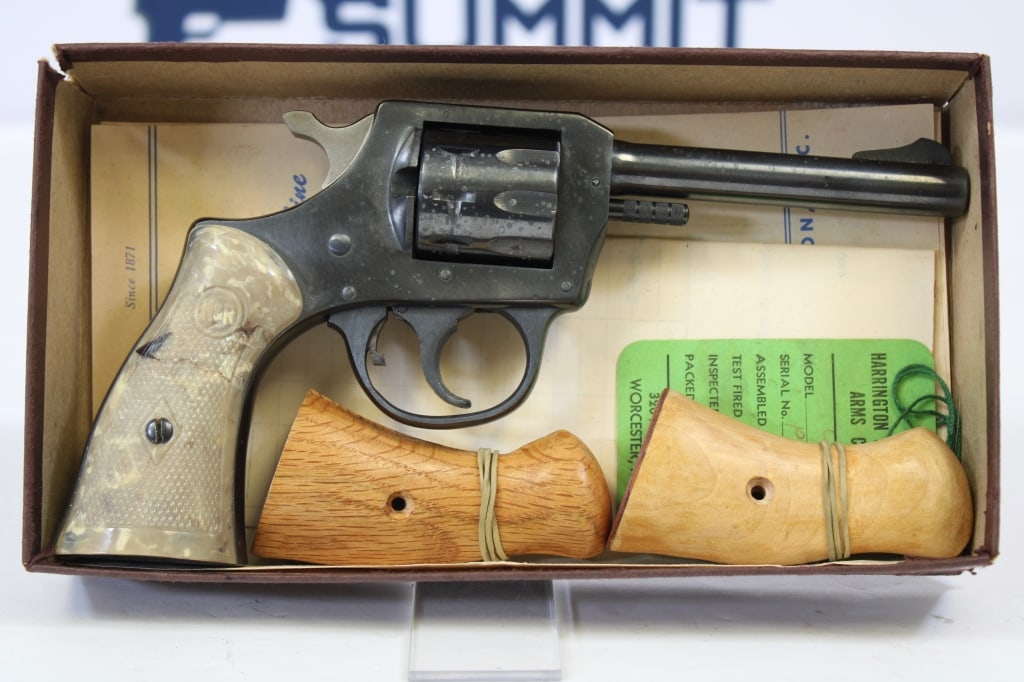 Harrington & Richardson 922 .22LR: This revolver comes with ramped front sights, original H&R plastic grips, extra wood grips, original paperwork and box. Please see photos. - Bore: Shiny , Action: DA/SA - 4