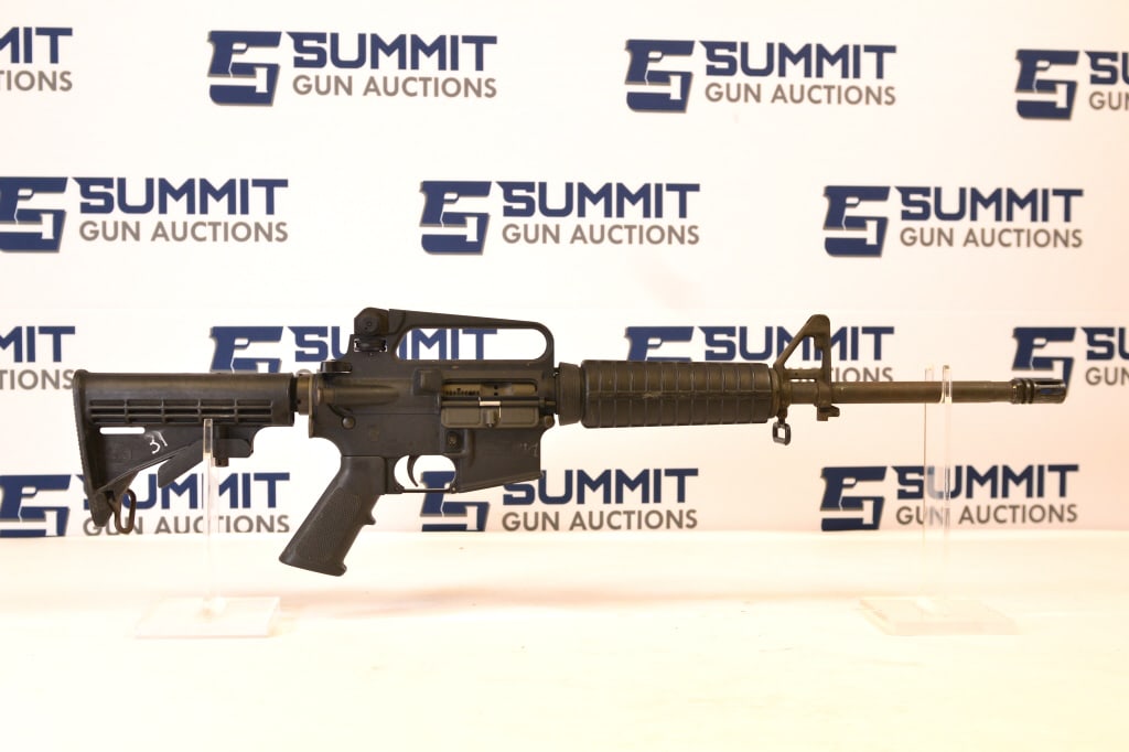 Bushmaster XM15-E2S .223/5.56mm: This Bushmaster AR-15 comes with a Magpul hand guard, sling attachments, carry handle, HBAR, restricted LE Stamp on the magazine well, and shows signs of normal wear and tear. Please see photos. - Bor