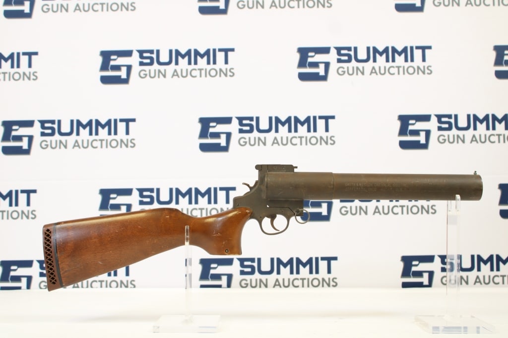 Smith & Wesson Chemical C Model 276 37mm: This smooth bore police trade-in gas gun made by S&W chemical Co Inc is a unique and fun piece. Hammer fired, break action comes with bead front sights, flip up rear sights, original wood stock, rubbe