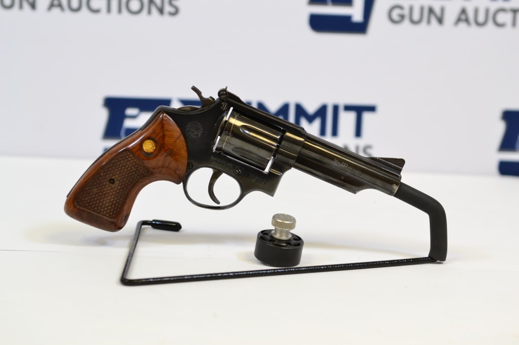 Taurus Model 66 .357 Magnum: Made in Brazil by Taurus, this is a clone of a Smith & Wesson .357 swingout cylinder revolver. It has a ramped front sight and an adjustable rear sight. Comes with leather case and one speedloader. Pl