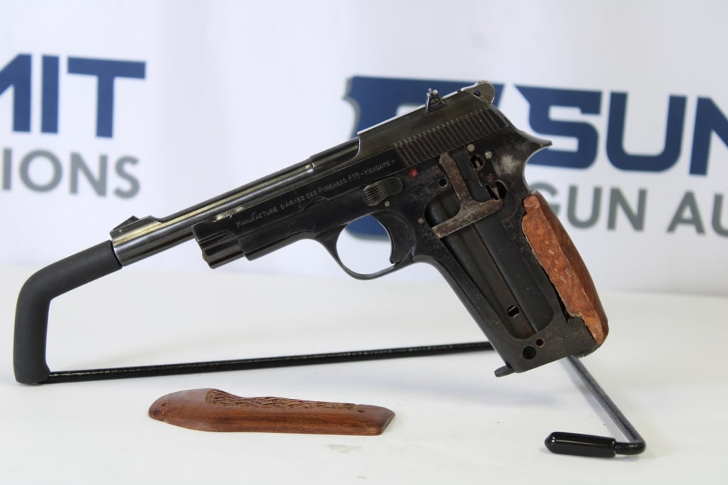 Wards Western Field Model 5 .22LR: This Wards Western Field import comes with adjustable front and rear sights, custom wood grips, selector safety, and one magazine. Missing grip screws. Overall in good condition. Please see photos. - 