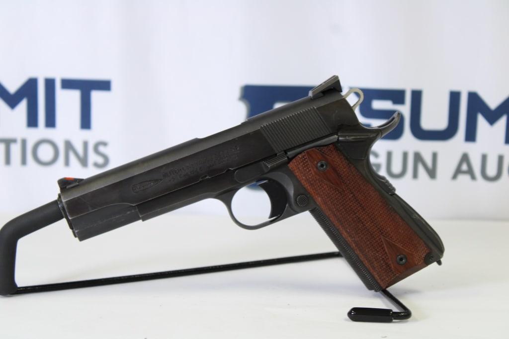Auto Ordnance Thompson 1911 .45 ACP: This AO 1911 comes with ramped front sights and fixed rear sights, wood grips, good bluing, and no magazine. Overall in good condition. Please see photos. - Bore: Shiny ; Action: Semi ; Length: 5 - AO