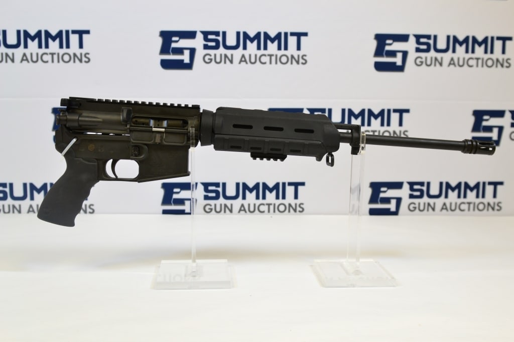 Bushmaster Carbon-15 5.56 NATO: Up for auction is a Bushmaster Carbon-15 AR chambered in 5.56 NATO. This AR features a 16 inch barrel, ergo grip, and magpul hand guard with a picatinny rail underneath. It has had the stock broken of