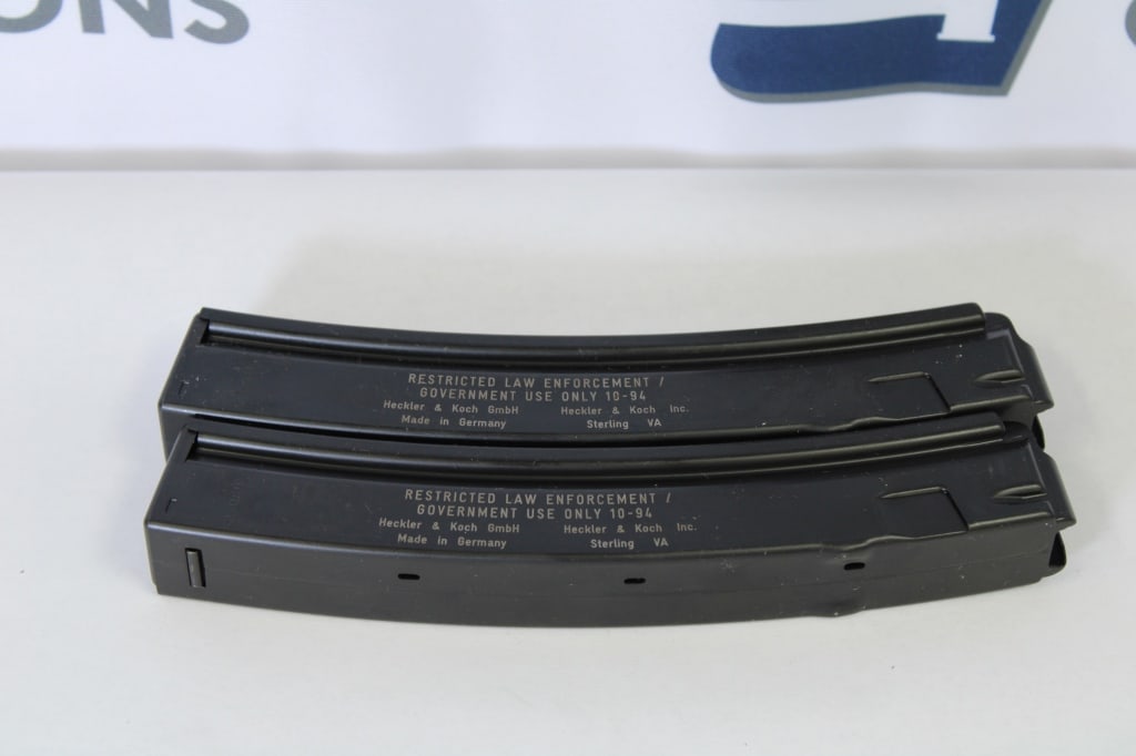 Lot of (2) Heckler & Koch MP5 Magazines 9mm: Up for auction is (2) made in Germany Heckler & Koch 9mm MP5 magazines with the markings "Restricted Law Enforcement / Government Use Only 10-94" on them. Please see photos. - Bore: ; Action: ; Length