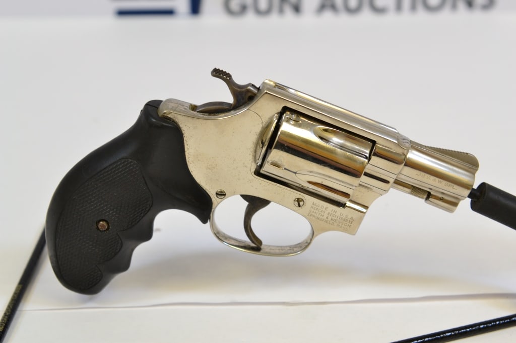 Smith & Wesson 36 .38 SPL: This revolver comes with ramp front sight, original grips, and shows normal signs of wear and tear. Please see photos. ; Barrel Length: 2 ; Bore: Shiny ; Action: DA/SA ; SN# J891438