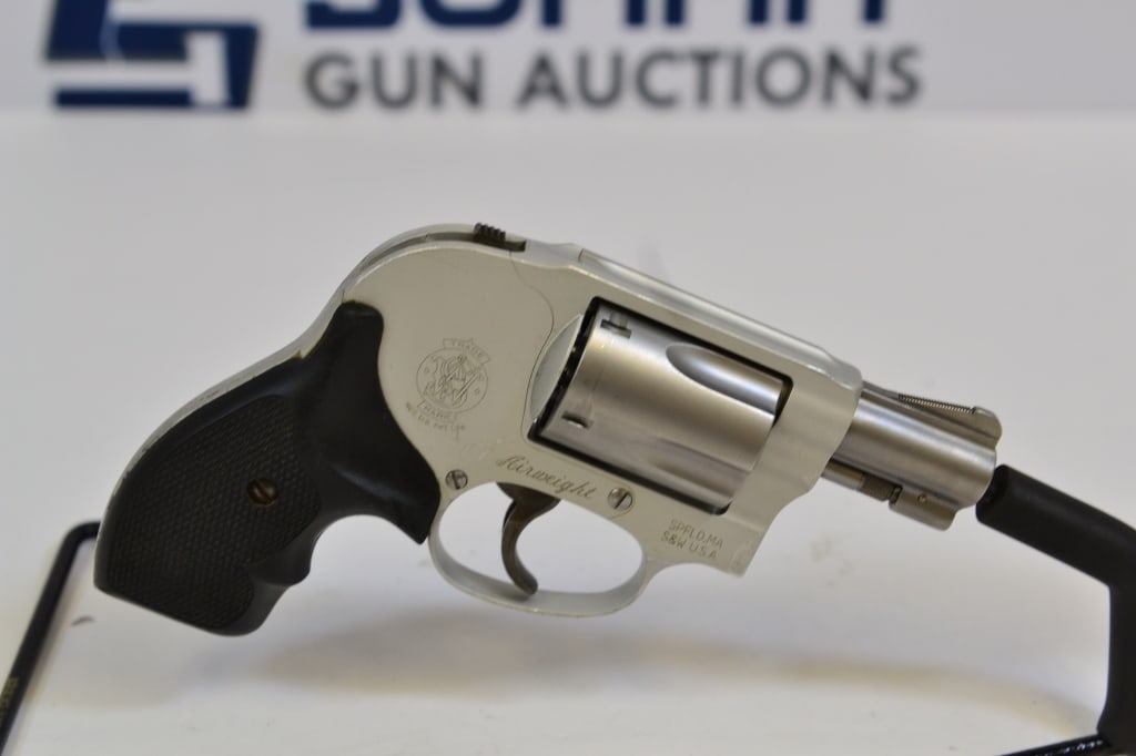 Smith & Wesson 638-3 .38 Spl +P: This 2" snub nose lightweight revolver comes with ramped front sights, grooved rear sights, rubber grips, 5-shot cylinder, concealed hammer. Please see photos. ; Barrel Length: 2 ; Bore: Shiny ; Actio