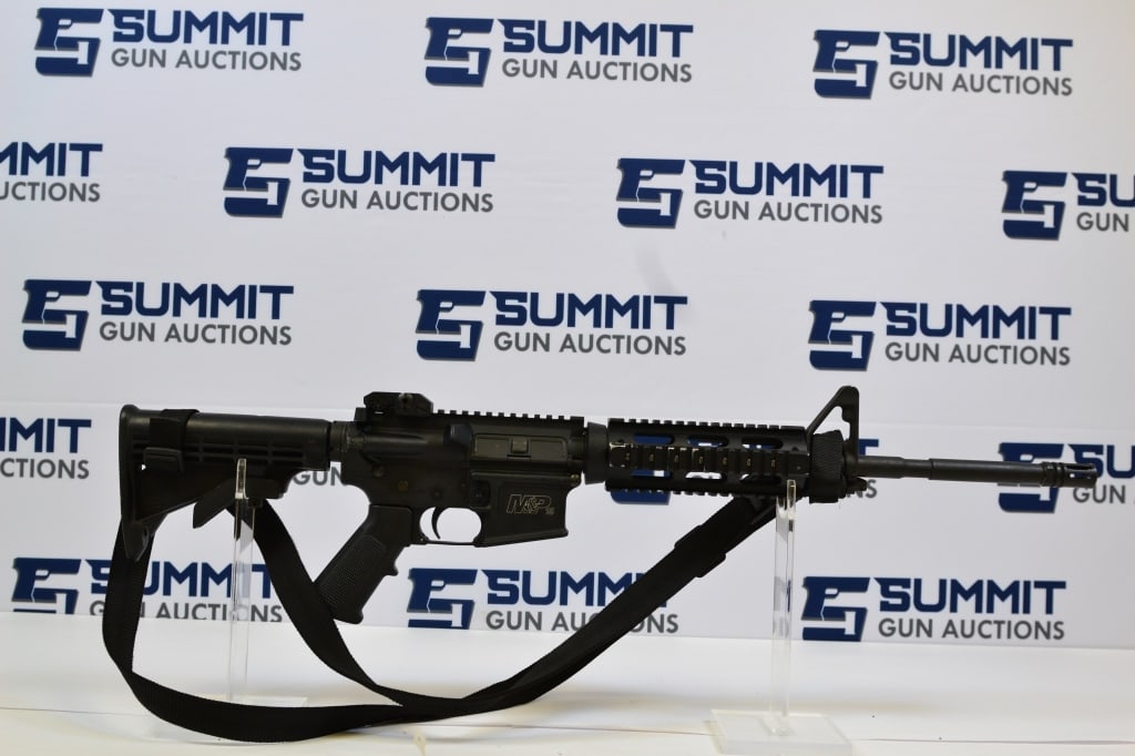 Smith & Wesson M&P-15 Sport II 5.56mm: Up for auction is a police trade-in S&W Sport II M&P-15. This rifle comes with UTG Pro handguard, fixed front sight, and S&W flip-up rear sight, no magazine, pistol grip, and sling. Overall in good co