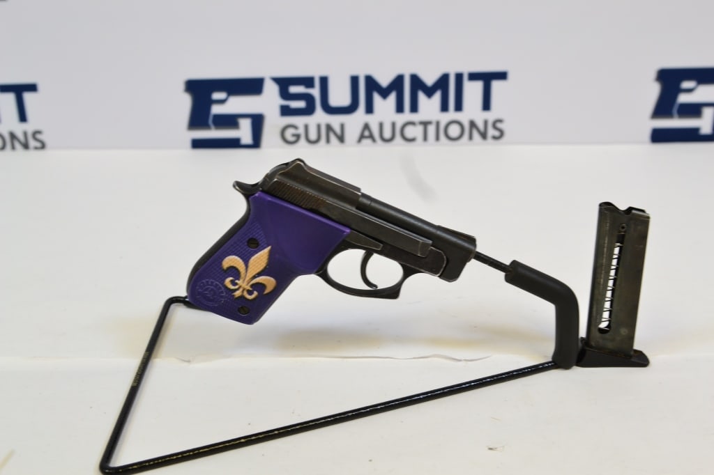 Taurus PT-22 .22LR: Up for auction is a .22 plinker compact pistol. Comes with ramped front sights and grooved rear sights, selector safety, with a purple grip with a fleur de lis on it. Comes with (1) magazine. Overall 
