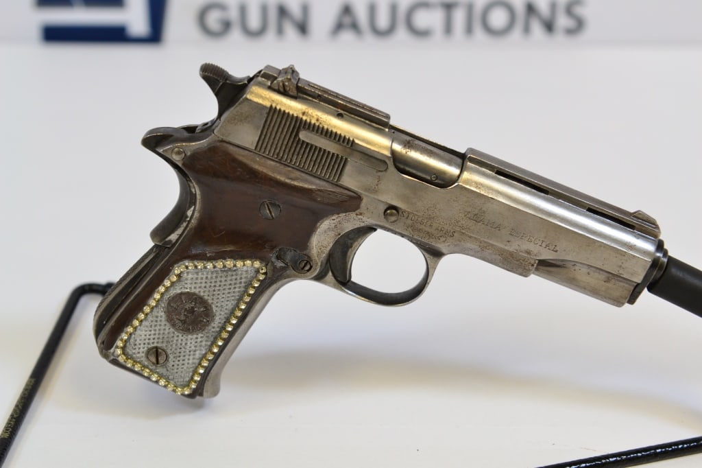 Stoeger Arms Llama .380 Auto: Up for auction is a Spanish 1911 style .380 pistol. Imported by Stoeger, it comes with fixed front and adjustable rear sights, stuck selector safety, grip safety and custom-painted and designed grips.