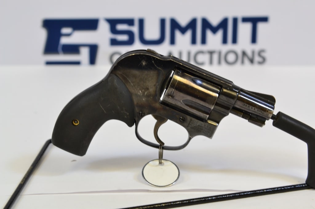 Smith & Wesson 49 .38 S&W Spl.: This snub nose revolver comes with ramp front sight, original grips, and shows signs of wear and tear. Please see photos. ; Barrel Length: 3 ; Bore: Shiny ; Action: Double ; SN# 359211
