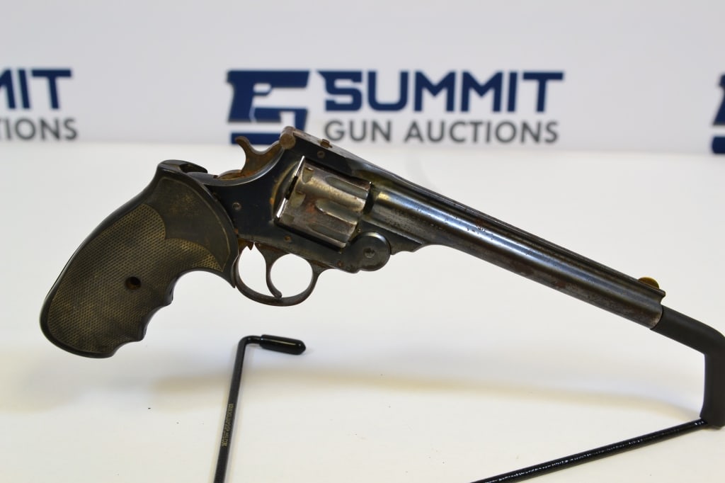 Harrington & Richardson 22 Special .22 LR: This 9 shot revolver comes with ramp front sight, black grips, and shows signs of wear and tear. Trigger sticks, needs work to operate. Please see photos. ; Barrel Length: 6 ; Bore: Shiny ; Action: DA