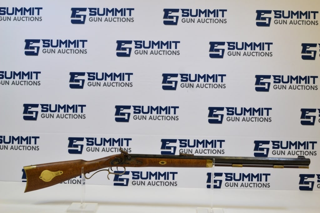 Traditions Hawken Woodsman .50 Cal: Up for auction is a Spanish made black powder muzzleloading rifle. Comes with a fixed front sights, adjustable rear sight, ram-rod, original wood stock, brass throughout, two triggers, rust visible th