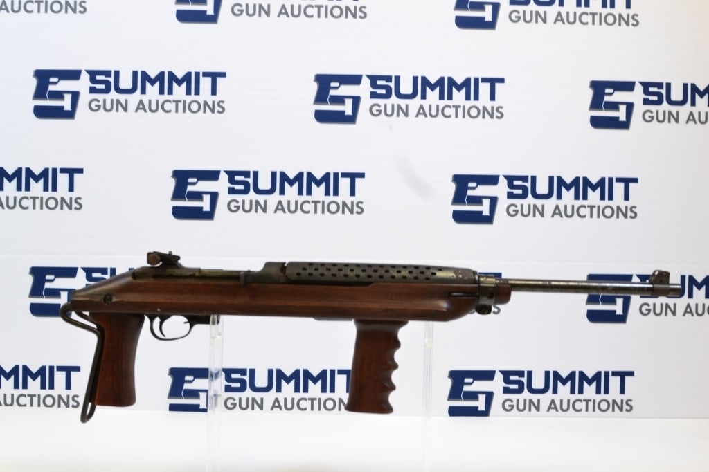 Plainfield Machine M1 Carbine .30 Cal: Up for auction is a Plainfield Machine M1 semi-auto rifle chambered in .30 cal. This WW2 style rifle features an 18 inch barrel, vertical foregrip, adjustable rear and iron front sights, refinished wo