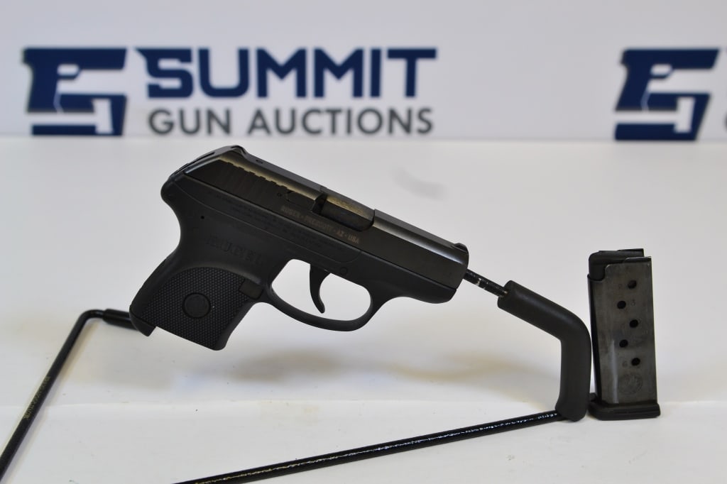 Ruger LCP .380 Auto: Up for auction is a Ruger LCP chambered in .380 auto. This pistol comes with fixed front and rear sights, one magazine, and is in overall good condition. Please see photos. - Barrel Length: 2.75 ; SN#