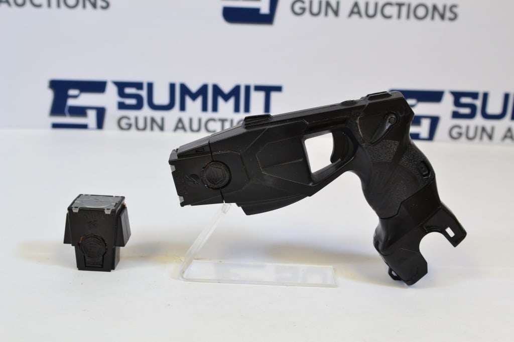 Axon X26P Taser: This unique Axon X26 taser is a great non-lethal option. It comes with 1 battery, 2 cartridges and the original box. This taser shows normal sign of usage. Please see photos. - Barrel Length: ; SN#: -