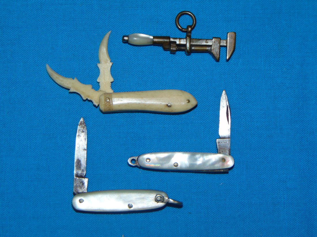 Miniature Folding Pocket Knife, Adjustable Wrench Fob Lot of 4, Bone & MoP: NICE LOT OF 3 MINI FOLDING KNIVES AND A FUNCTIONING ADJUSTABLE WRENCH. THE TWO KNIVES WITH MOTHER OF PEARL ARE MARKED GERMANY.