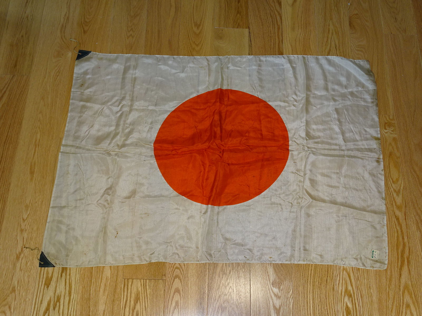 WWII Japanese Meatball Flag: NICE WWII JAPANESE MEATBALL FLAG. MEASURES APPROX. 26x36". THIS THING HAD BEEN IN A COLLECTIION SO LONG, IT STILL HAS A PRICE TAG OF $4...!