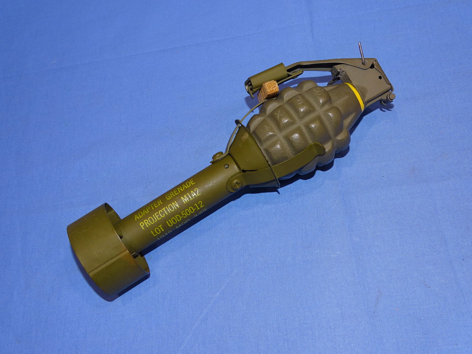 Inert / Dewat Vietnam War Era M1A2 Practice Rifle Grenade, 3-69 Dated: WWII ERA U.S. PINEAPPLE GRENADE. INERT & DEWAT. WILL NOT SHIP OUTSIDE THE U.S., NO EXCEPTIONS!