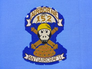 Rare WWII 11th Airborne 152nd Anti-Aircraft  Artillery Bullion Patch, Japanese Made