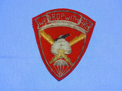 Rare WWII 11th Airborne 457th Field Artillery WE DROP WITH FIRE Bullion Patch, Japanese Made: RARE WWII 457TH AIRBORNE FIELD ARTILLERY PATCH, JAPANESE MADE IN BULLION SUPER NICE CONDITION.