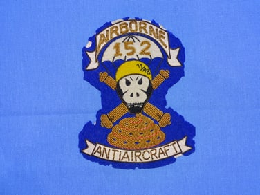 Rare WWII 11th Airborne 152nd Anti-Aircraft Artillery Bullion Patch, Japanese Made