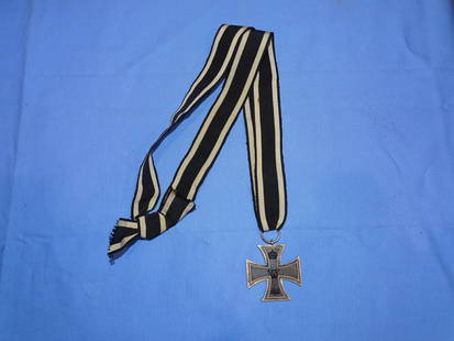 WWI German 1914 Iron Cross EKII on Unusually Long Ribbon: VERY NICE WWI GERMAN 2nd CLASS IRON CROSS WITH AN UNUSUALLY LONG RIBBON, TIED OFF LOOKING TO BE WORN AROUND THE NECK.
