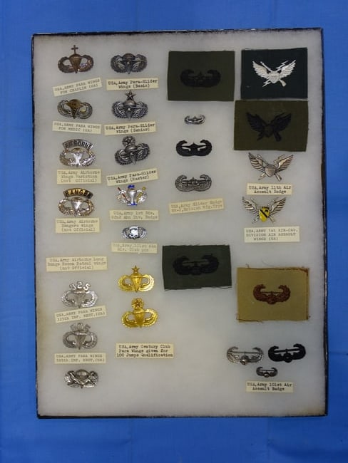 Airborne Paratrooper Special Forces Wings, Patch Insignia Lot, UNITED STATES: LARGE COLLECTION OF AIRBORNE PARATROOPER INSIGNIA, YOU WILL RECEIVE THE EXACT ITEMS SHOWN IN THE CASE, INCLUDING THE DESCRIPTIONS. THE RIKER MOUNT CASE IS NOT INCLUDED.