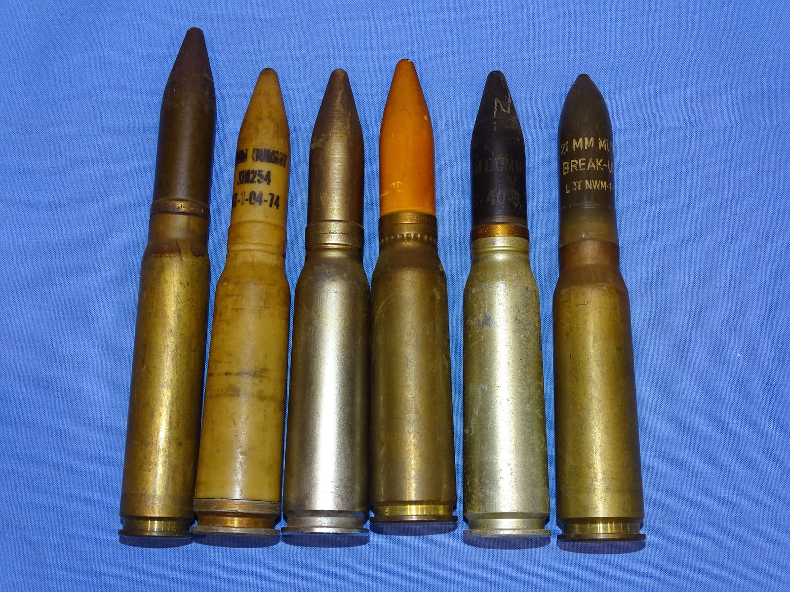 Inert / Dewat Ordnance, WWII - Vietnam War Era 20mm Artillery Shell Lot: INERT / DEWAT ORDNANCE PIECES. WILL NOT SHIP OUTSIDE THE U.S., NO EXCEPTIONS!