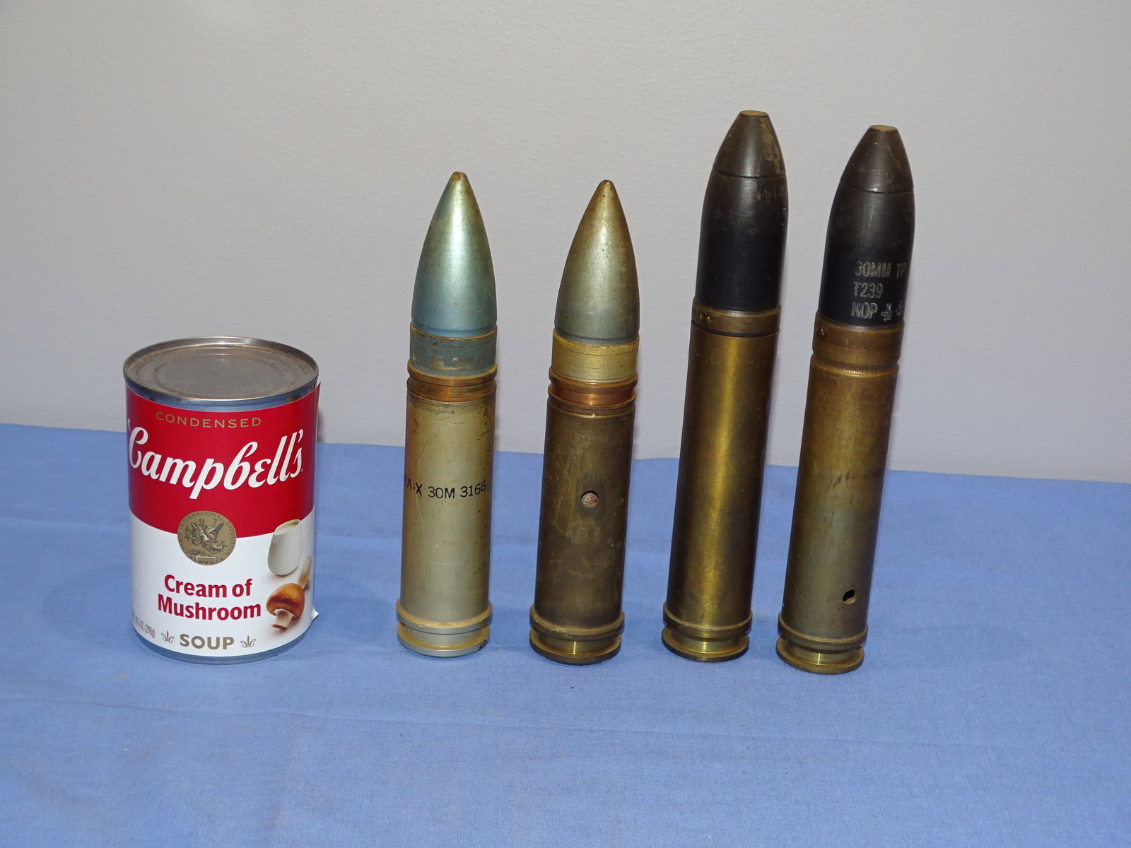 Inert / Dewat Ordnance, WWII - Vietnam War Era 30mm Artillery Shell Lot: INERT / DEWAT ORDNANCE PIECES. WILL NOT SHIP OUTSIDE THE U.S., NO EXCEPTIONS!