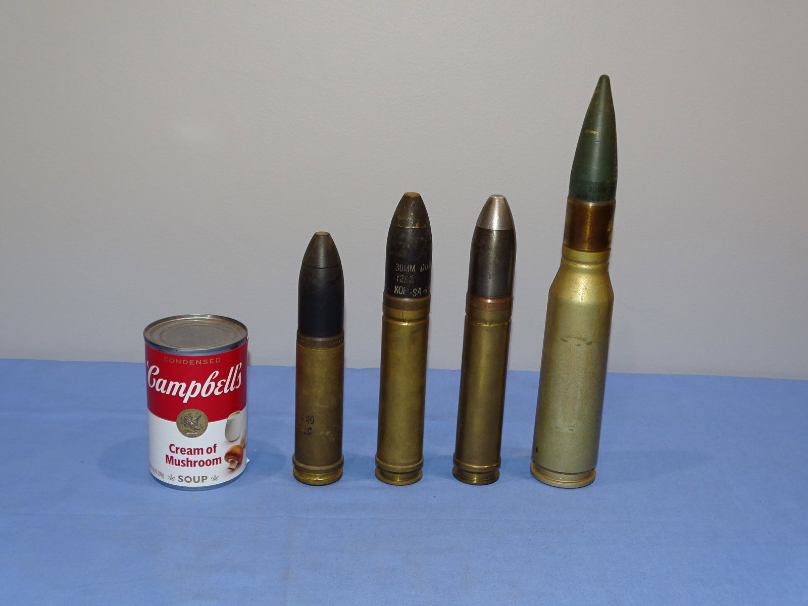 Inert / Dewat Ordnance, WWII - Vietnam War Era 30mm Artillery Shell Lot: INERT / DEWAT ORDNANCE PIECES. WILL NOT SHIP OUTSIDE THE U.S., NO EXCEPTIONS!