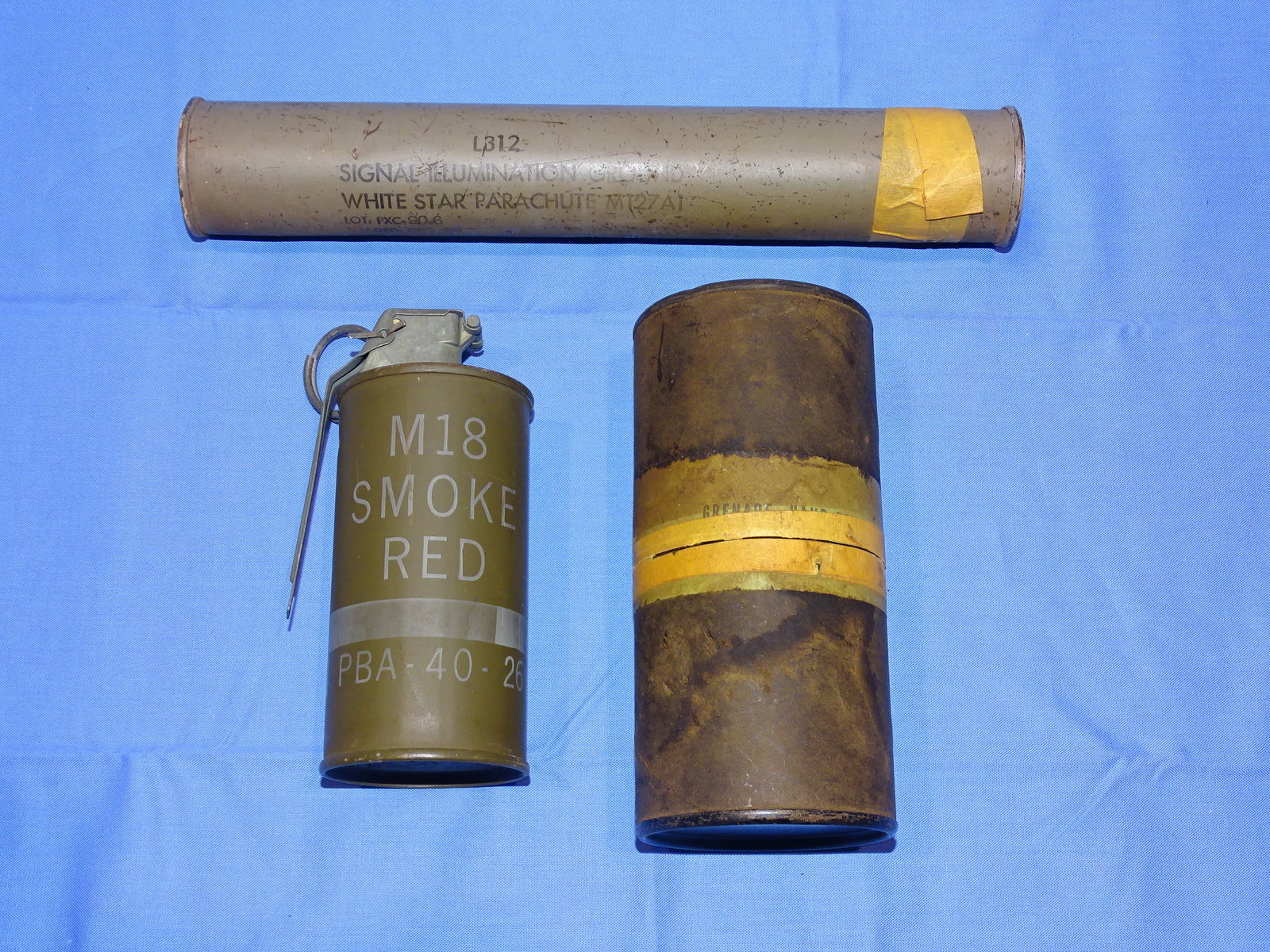 Vietnam War Era Smoke Grenade / Signal Flare Pair: NICE PAIR OF VIETNAM WAR ERA SMOKES IN THEIR ORIGINAL CONTAINIERS. WILL NOT SHIP OUTSIDE THE U.S.