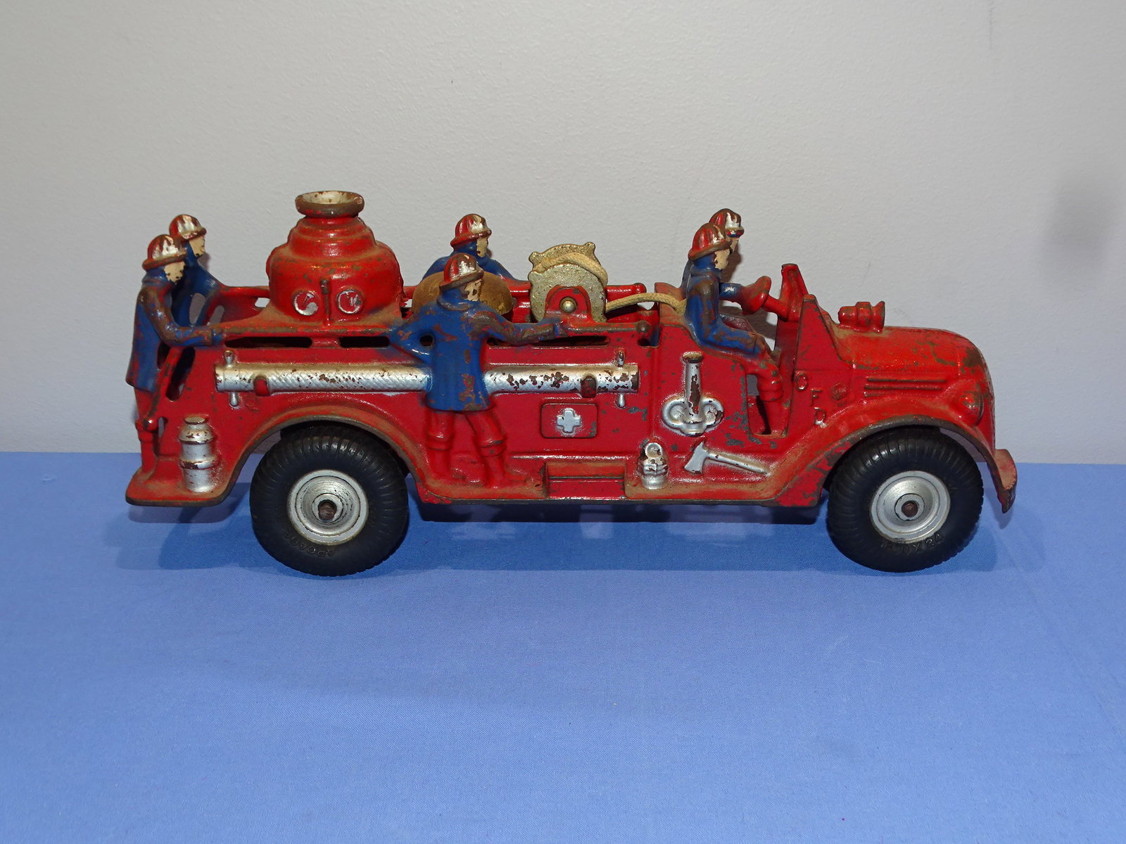 1930's ARCADE 6 Rider, 13" Cast Iron Fire Truck: NICE ORIGINAL PAINT ARCADE CAST IRON FIRE TRUCK. THERE IS DAMAGE TO THE DRIVERS FRONT CORNER, BUT STILL DISPLAYS NICELY.
