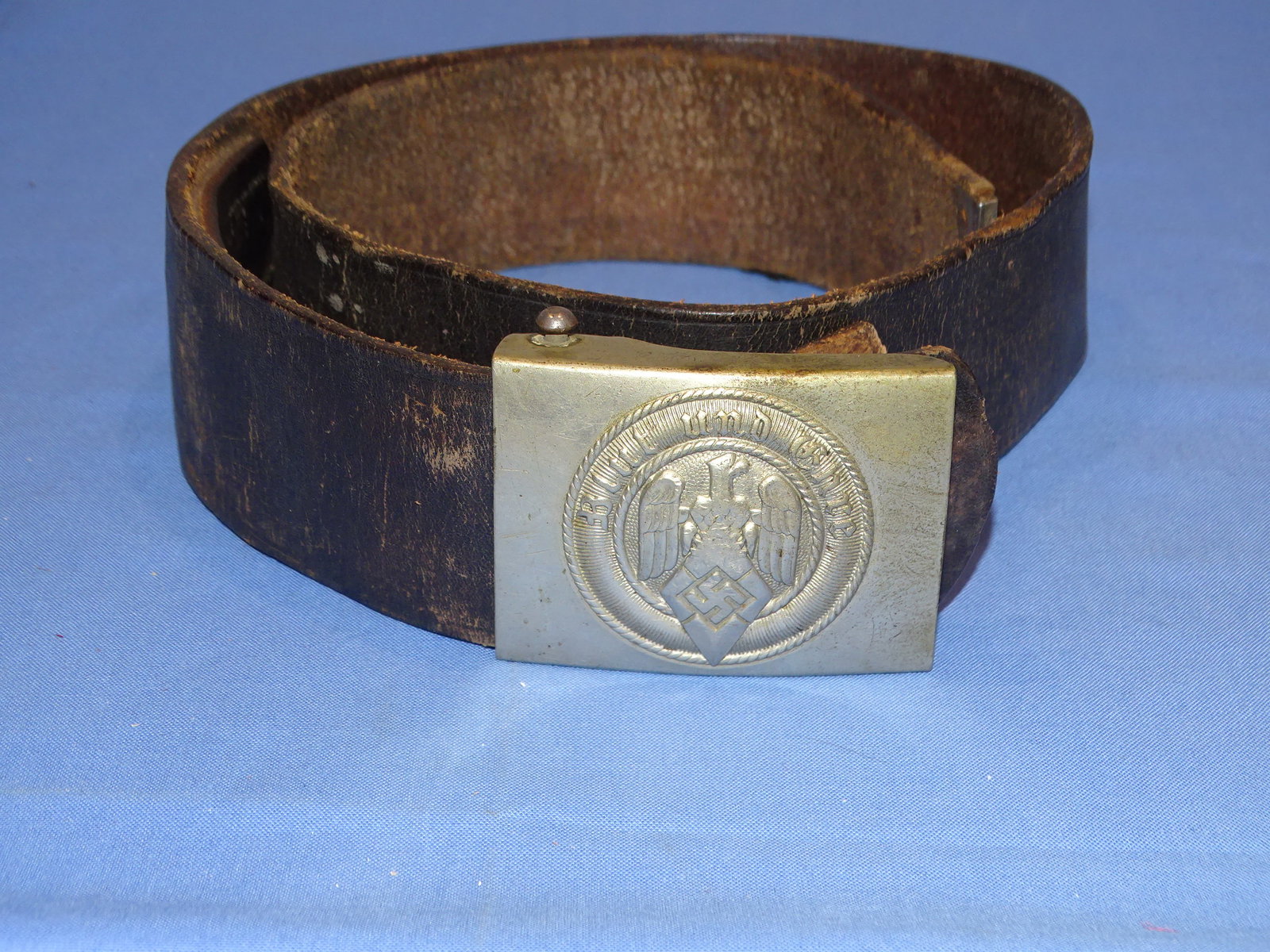 WWII German Hitler Youth HJ Belt w/ Rare Buckle: WWII GERMAN HJ BELT & BUCKLE WITH RARE VARIENT LONG NECKED EAGLE. NICKEL SILVER BUCKLE IS UNMARKED, BELT IS UNMARKED AS WELL AND MEASURES APPROX. XXX" LONG OVERALL.