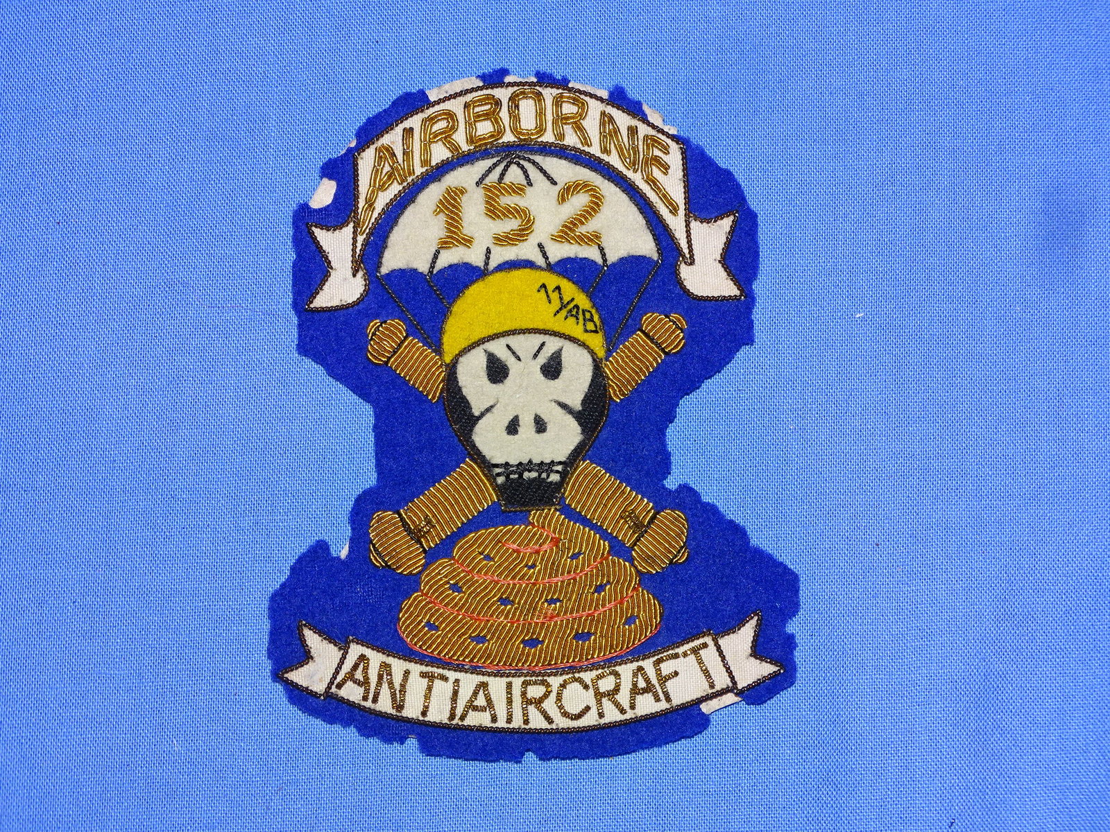Rare WWII 11th Airborne 152nd Anti-Aircraft Artillery Bullion Patch, Japanese Made (1 of 7)