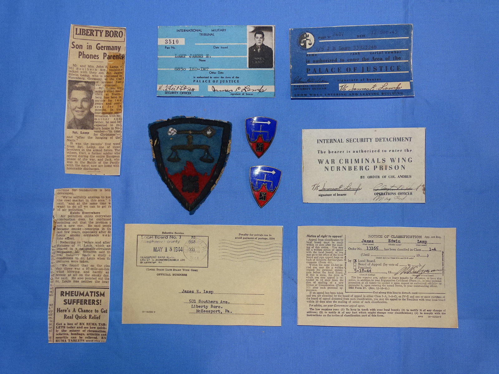 Super Rare WWII Nurnberg Prison War Crimes Trials ID'd Bullion Patch & Enamel DUI Lot: SUPER RARE GROUPING OF WWII NURNBERG WAR CRIMES TRAILS INSIGNIA. THIS INSIGNIA WAS DIRECT VETERAN JAMES LAMP FAMILY ACQUIRED. GERMAN MADE BULLION PATCH SHOWS SOME MINOR LOSSES ABOUT THE EDGES FROM BEI
