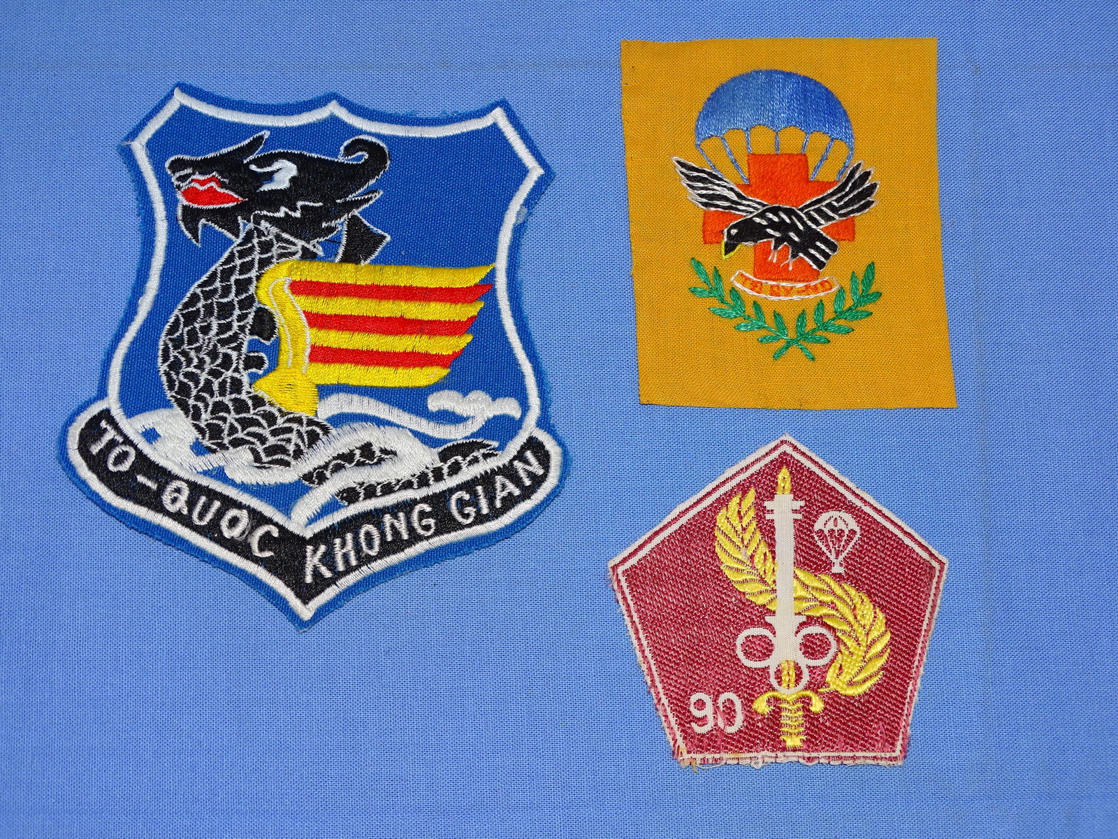 Original Vietnam War Patch Lot, Embroidered: NICE TRIO OF 100% ORIGINAL VIERNAM WAR ERA PATCHES, THESE ARE EMBROIDERED, ONE WITH CONTACT PAPER APPLIED TO THE REVERSE, AN OLD COLLECTOR HABIT.