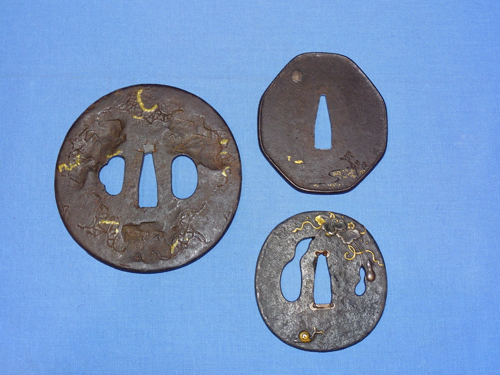 Japanese Samurai Sword TSUBA Lot of 3 Iron: JAPANESE SAMURAI SWORD TSUBA LOT OF 3 IRON, ONE LARGE KATANA SIZED AND 2 WAKIZASHI SIZED.