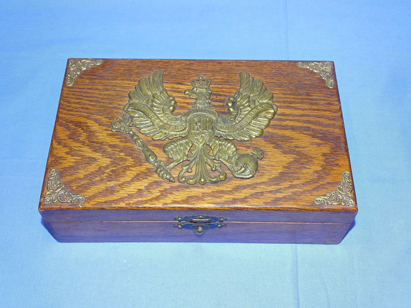 WWI German Pickelhaube Spiked Helmet Frontplate Decorated Box: VERY INTERESTING FRONTPLATE DECORATED WOODEN BOX. IT MEASURES APPROX. 9" x 6'' x 2 3/4". NICE PIECE FOR THE PICKELHAUBE COLLECTOR.